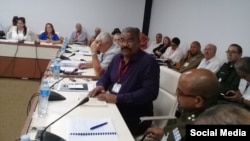 Al centro Rubén Remigio Ferro, presidente del Tribunal Supremo Popular de Cuba.