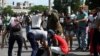 Un manifestante es arrestado el 11 de julio de 2021 en La Habana. (Yamil Lage/AFP).